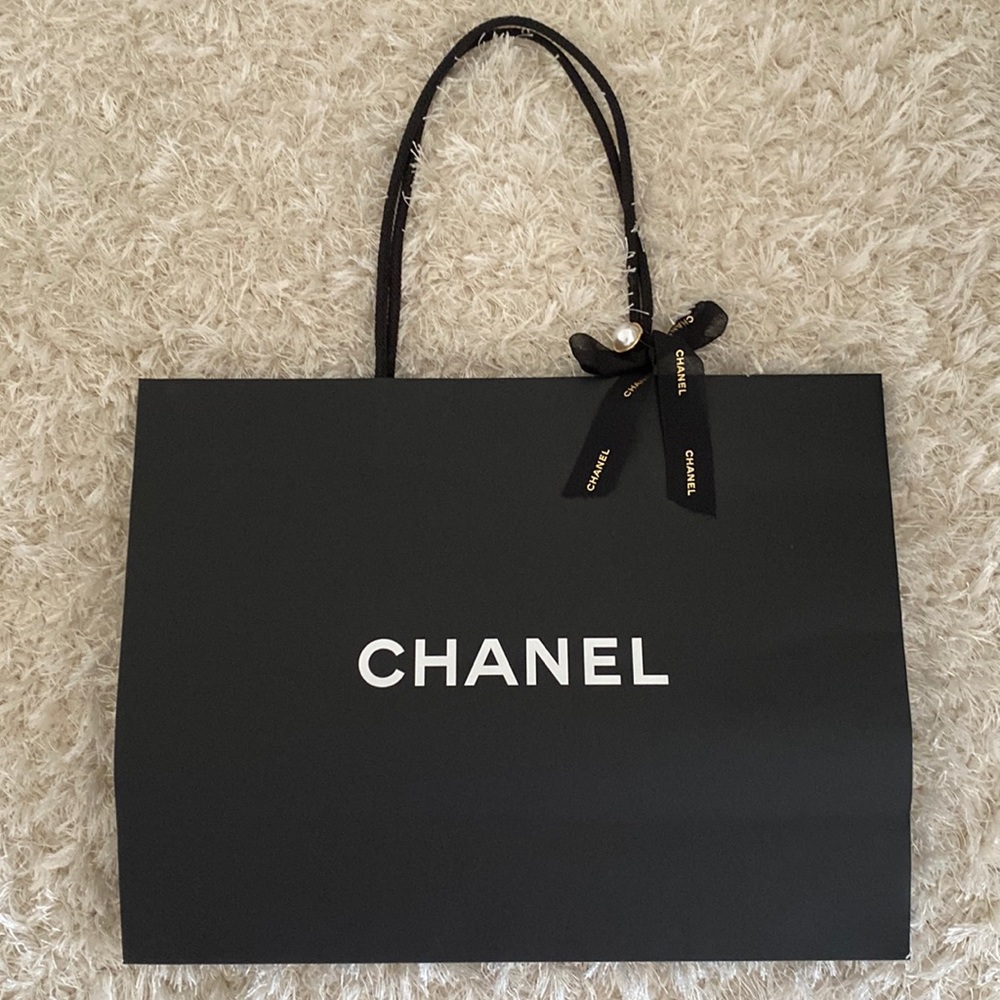 Chanel Paper Shopping Bag with the black ribbon